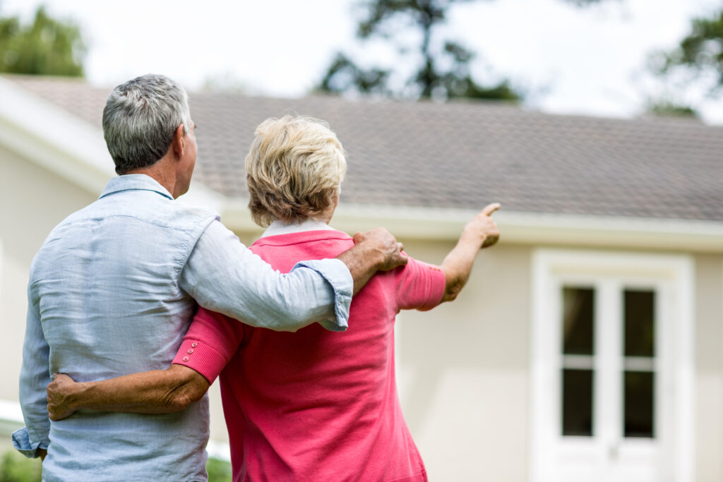 Real estate consultation helping seniors find the right downsizing home